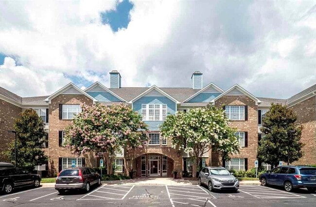 Building Photo - Spacious top-floor condo — 2BR/2BA with hardwood floors, electric fireplace & deposit-free move-i...
