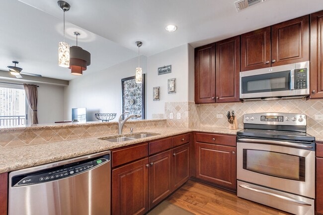 Building Photo - GORGEOUS FURNISHED CONDOMINIUM WITH GREAT ...