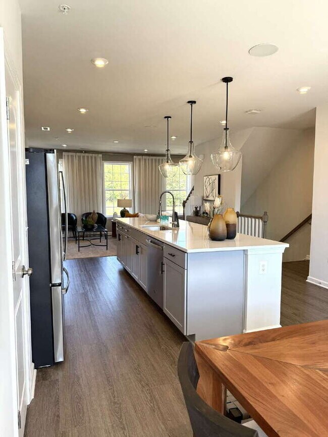 Building Photo - Be the First to Live Here! Brand-New 3BR Condo in Coalfield Station – Modern Living in the Heart ...