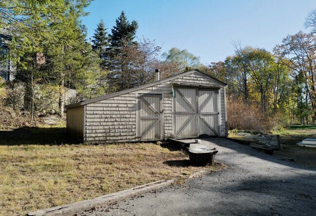 detached garage with wood stove - 252 Cedar St