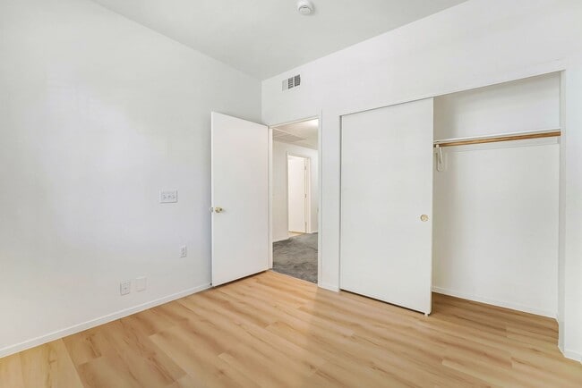 Building Photo - Spacious single-level, first-floor unit featuring 3 bedrooms and 2 bathrooms.