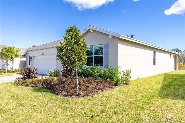 Building Photo - 6751 SE Pk Trce Dr
