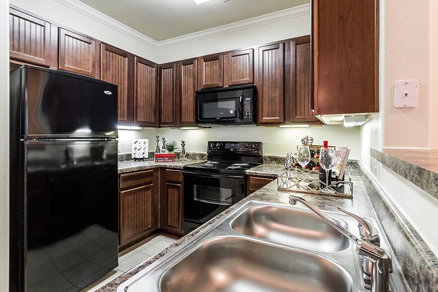 Classic homes include black appliances - Glenhaven at Star Ranch