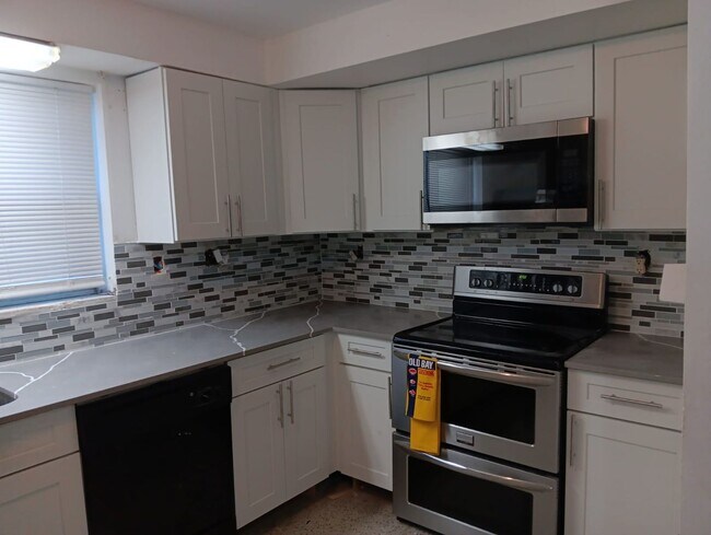 Building Photo - Renovated 3BR/2BA Corner Single-Family Home – Large Fenced Yard, NO HOA