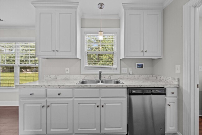Building Photo - Three-bedroom, two-bathroom home located i...