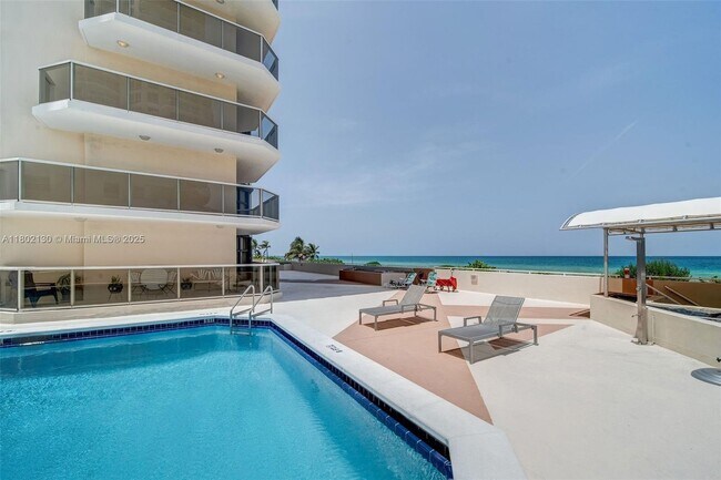 Building Photo - 6423 Collins Ave