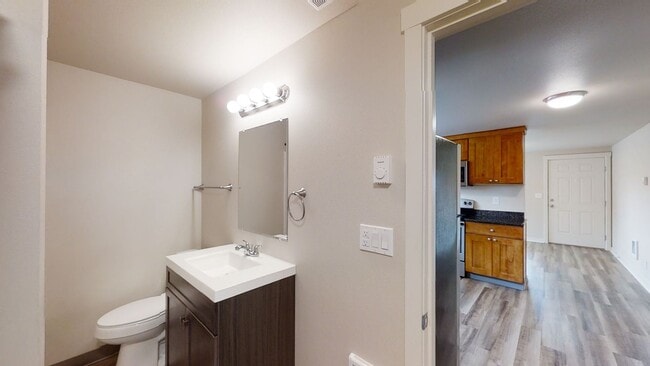 Building Photo - Charming 2 Bedroom Duplex - Granite Counters, Plank Flooring, Fully Fenced, Storage Shed!