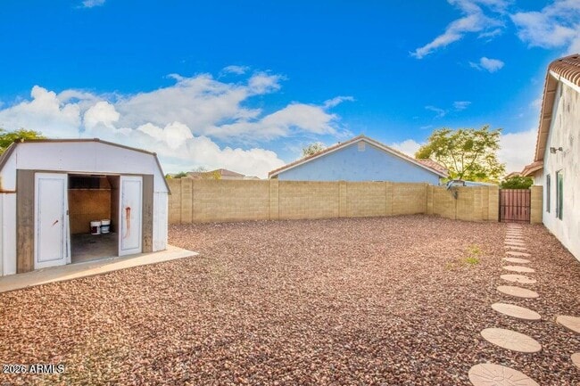 Building Photo - 6585 N 77th Dr