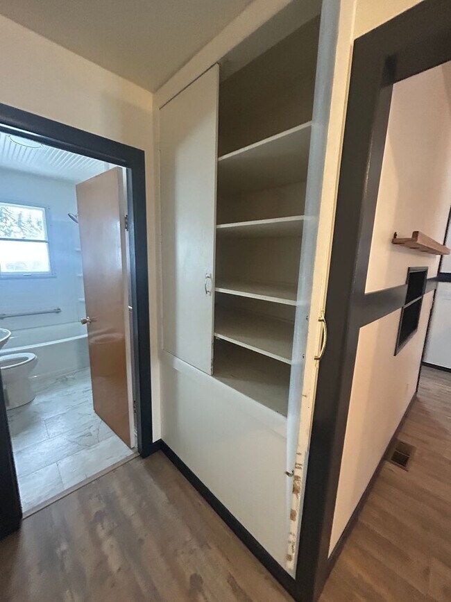 Building Photo - Bigfork Rodeo Farmhouse~ Fenced garden, greenhouse, garage, barn and shop!