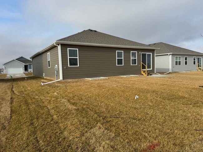 Building Photo - Never-Lived-In 4-Bedroom Ranch with Finished Basement Near Offutt AFB