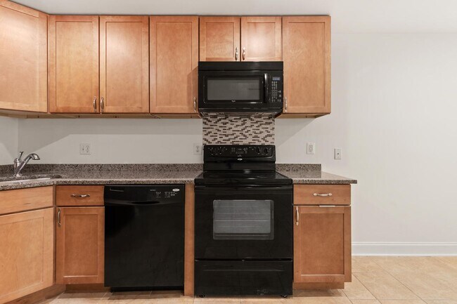 Building Photo - Charming One-Bedroom Basement Apartment