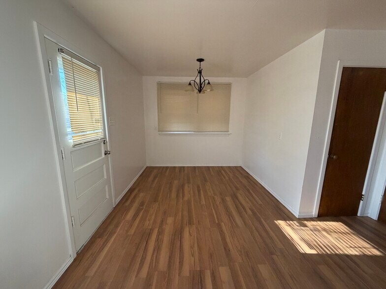 Dining room has new hardwood floors! - 1848 Swan Dr