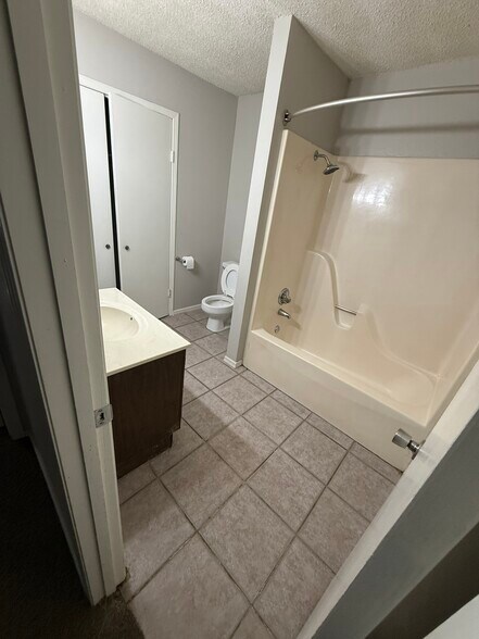 Primary bath with large linen closet - 828 Hardy Springs Cir