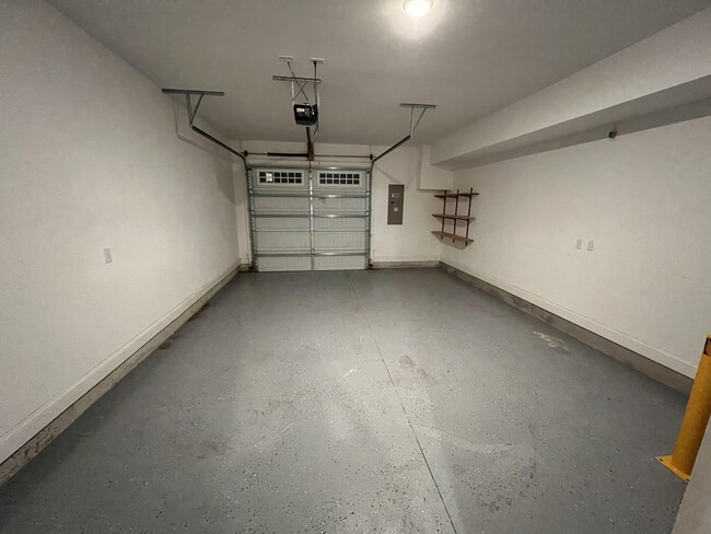 1 car garage with side storage space - 1006 Gateway Commons Cir