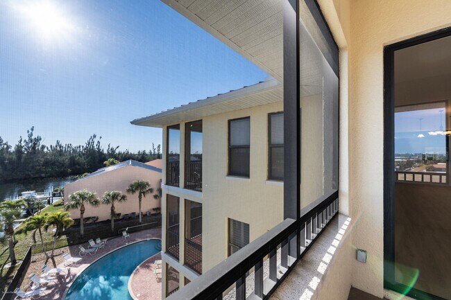 Building Photo - PRICE DROP!! Luxury Waterfront Living with Deeded Dock – Punta Gorda Isles