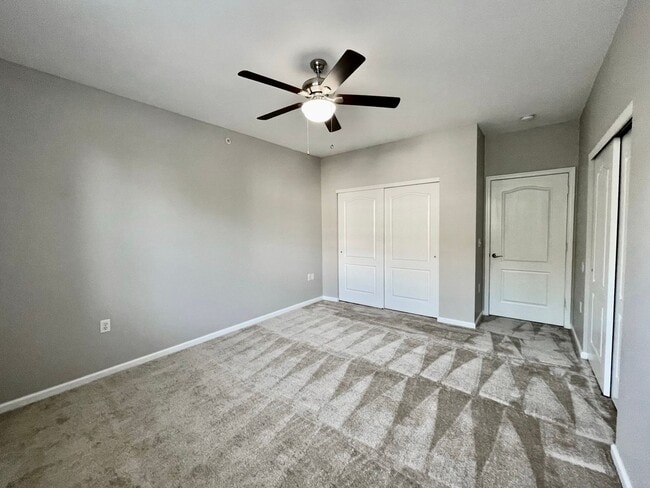 Building Photo - 2 Bedroom Condo w/Open Floor-Plan & Stainless Steel Appliances! Some Utilities Included!
