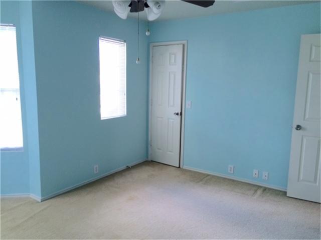 Loads of windows and a walk in closet. - 23619 Twisting Falls Drive