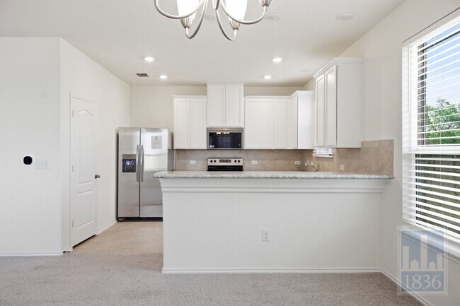 Building Photo - 7812 Song Sparrow Dr.