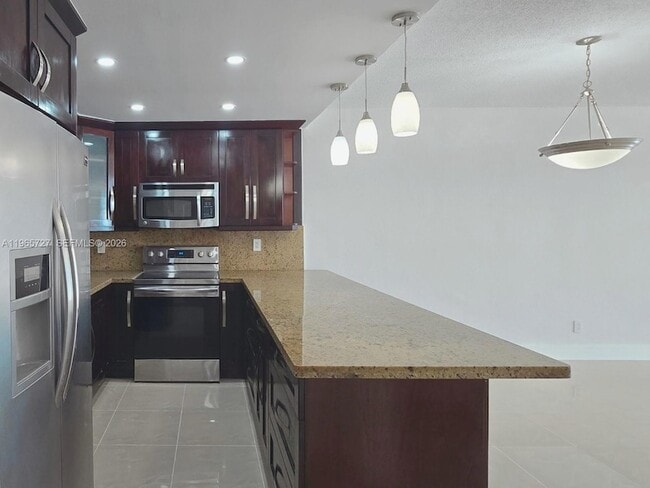 Building Photo - 19380 Collins Ave