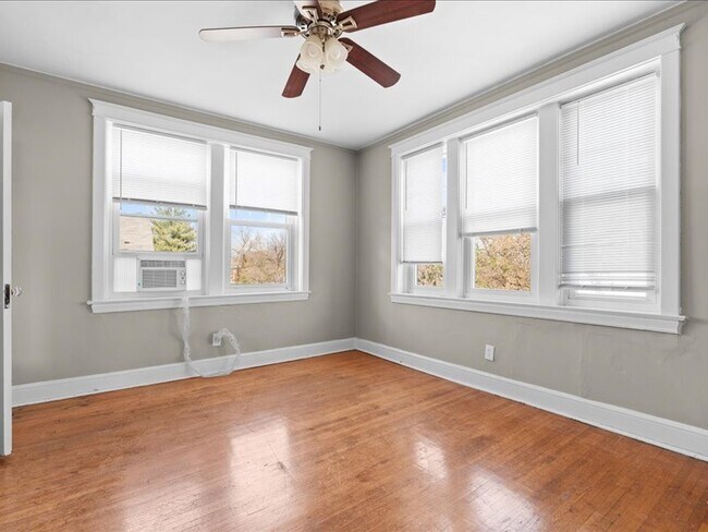 Building Photo - 7204 Zephyr Place - 2E