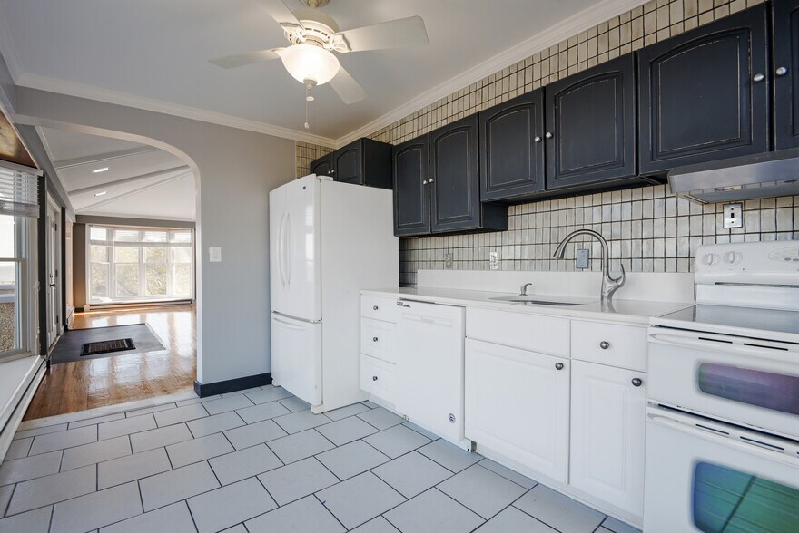 kitchen with upgraded appliances - 1301 Rogers Rd