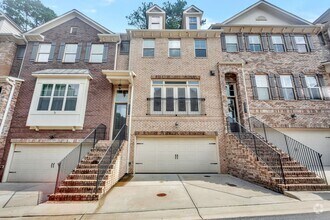 Building Photo - Stunning Executive Townhome in Gated Brook...
