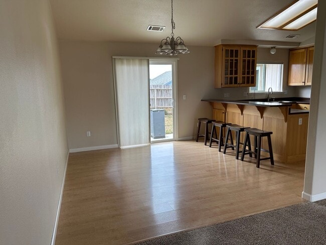 Building Photo - Sunny 3 Bedroom, 2 full bath w/Solar and B...