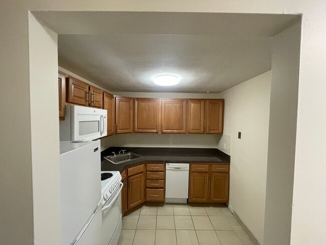 Building Photo - Divided Studio with Balcony over Watertown Square