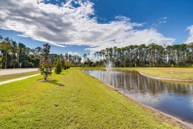 Building Photo - Like New 3/2.5 Port Orange Townhome Availa...