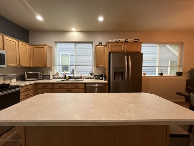 Building Photo - Modern 2 Bedroom + Bonus Room Townhome Near Nike with Dual En Suites, Balcony & Attached Garage