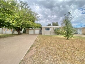 Building Photo - 3 bed 1 bath 2 car garage now available in...