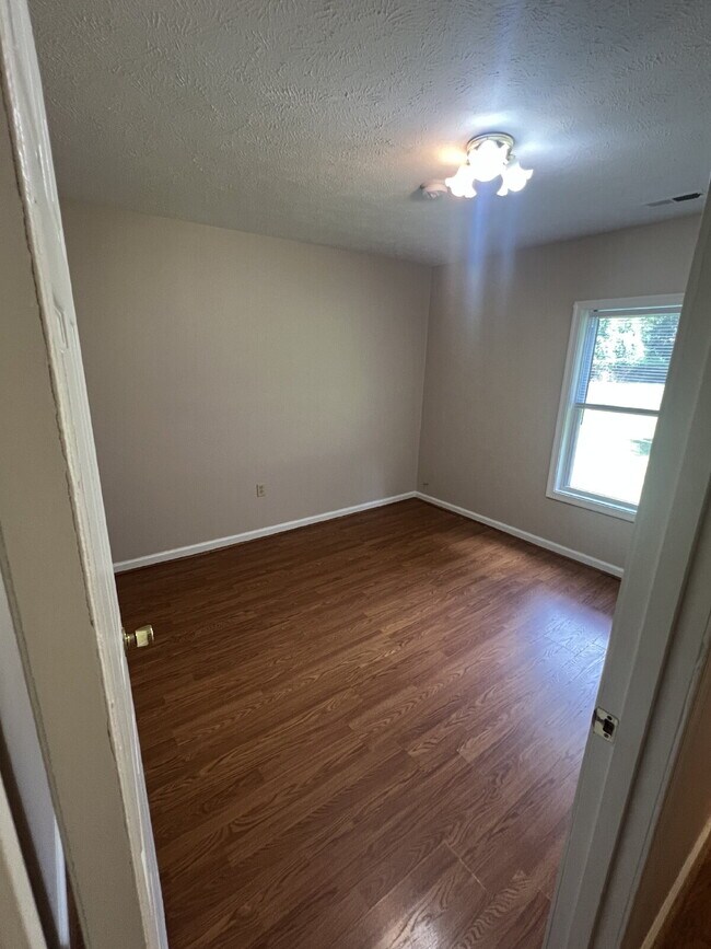 Building Photo - Charming 2-Bedroom Home Plus Bonus Attic S...
