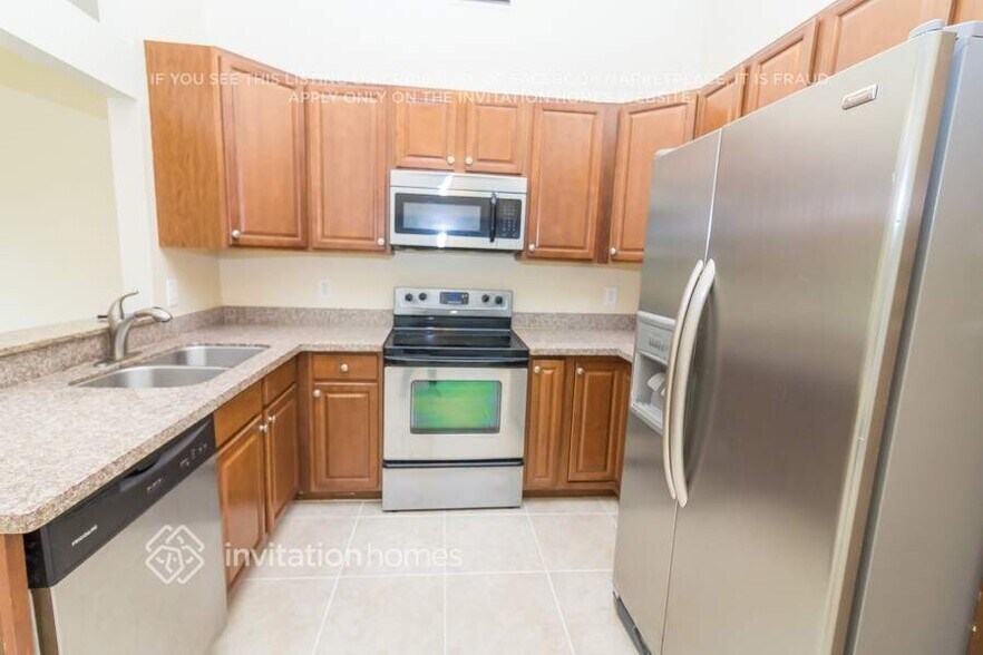 Building Photo - 8447 Red Wagon Ln