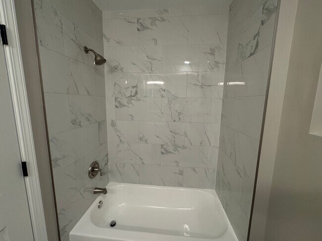 Building Photo - Stunning gut-renovated 3-bedroom, 2-bath condo in South Shore