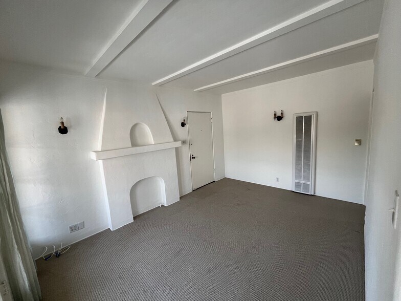 Living room, front door & wall heater - 1617 California Ave