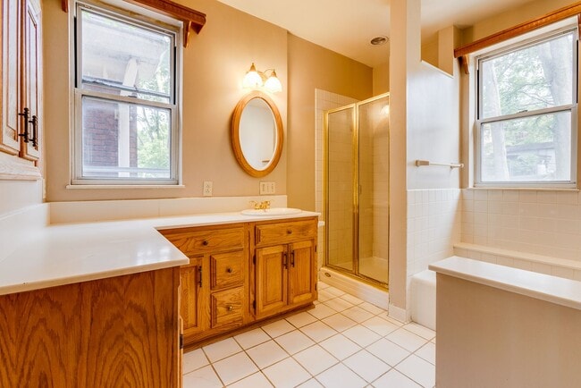 Building Photo - AVAILABLE June 2026 - Beautiful 4 Bedroom, 2 Bath Home w/ Front Porch Swing!