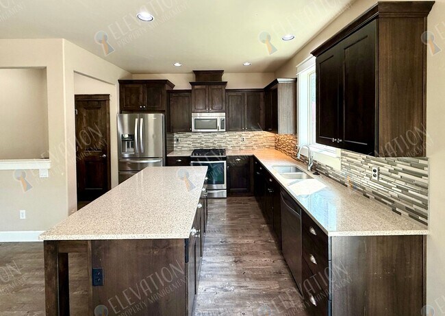 Building Photo - 63151 Black Powder Ln