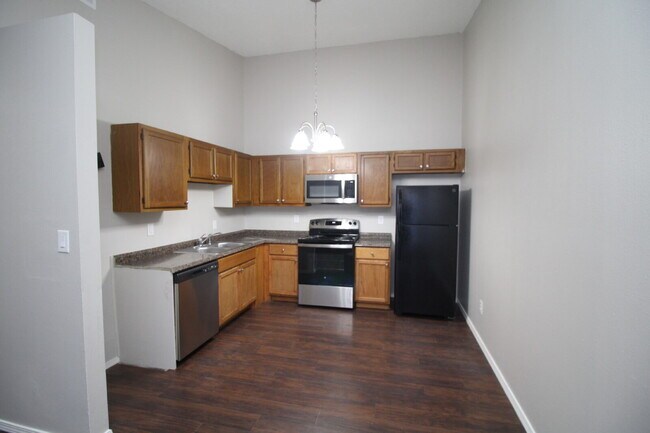 Building Photo - Ready Now Updated Two Bedroom Apartment with Wood Look Flooring and New Appliances & ½ OFF FIRST ...