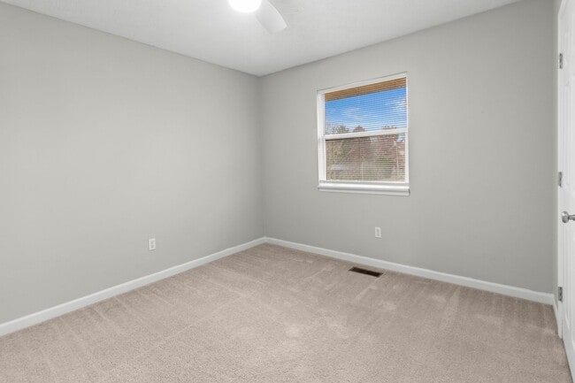 Building Photo - Broad Ripple townhome with garage, updated kitchen, and walkable convenience!