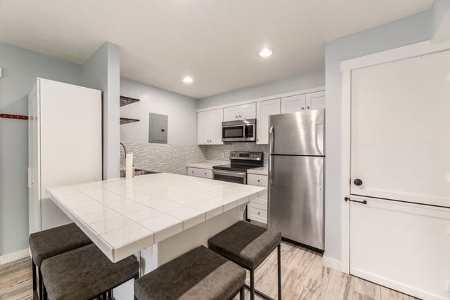 Building Photo - Updated Condo In Excellent Location, First...