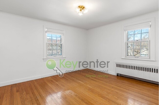 Building Photo - Charming 4-Bedroom Home on 2 Acres—Woods, Trails & Exceptional Storage