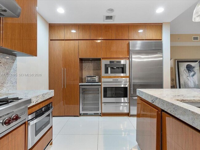 Building Photo - 9705 Collins Ave