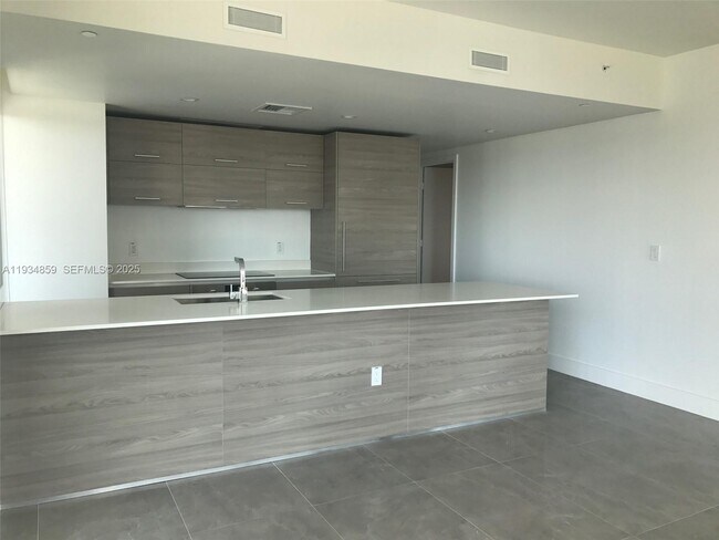 Building Photo - 1300 S Miami Ave