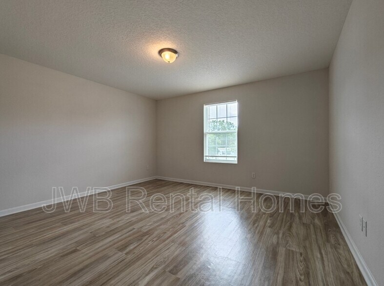 Building Photo - 8498 McGirts Village Ln