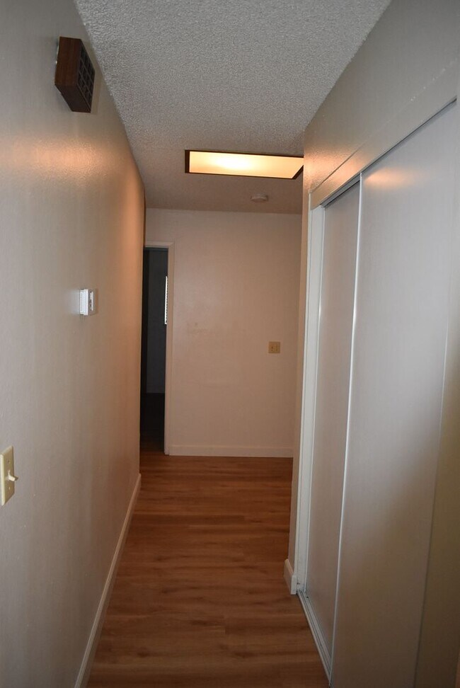 Building Photo - 4-bedroom home with luxury vinyl flooring and much more!