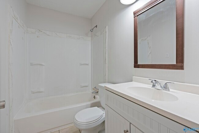 Building Photo - 1306 Oshaughnessy Ave NE