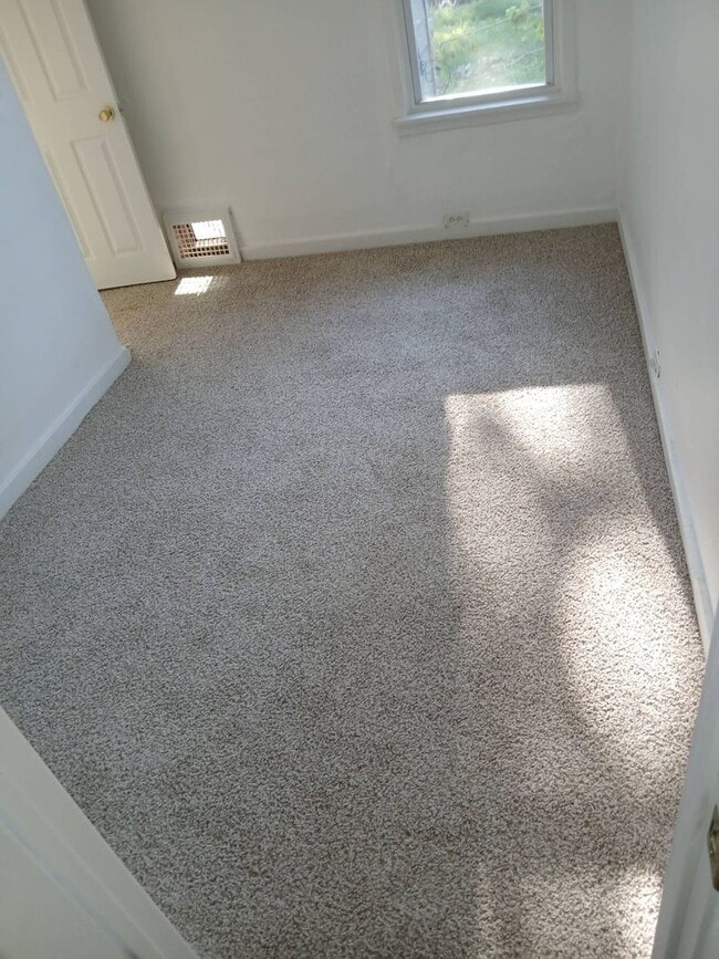 Building Photo - Newly Renovated 4BR/1BA Single-Family Home with Garage – Cleveland