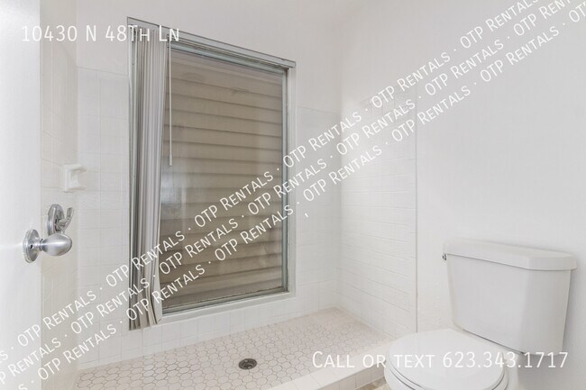 Building Photo - 10430 N 48th Ln