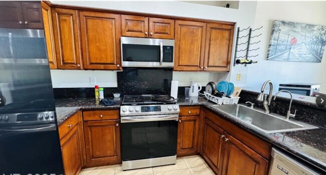 Building Photo - 5155 W Tropicana Ave