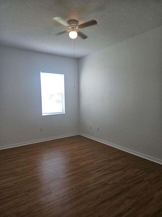 Building Photo - 4 BEDROOM 3 FULL BATH HOME WITH A SCREENED IN POOL IN THE BEAUTIFUL PALM COAST